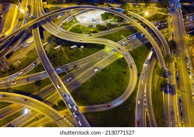 Aerial View Of Lighted Highway Road Junctions At Night