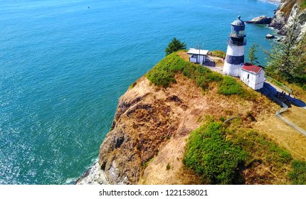 Aerial View Of Lighthouse On Cape Disappointment On Rocky Point - Washington, USA - 4K Aerial Footage