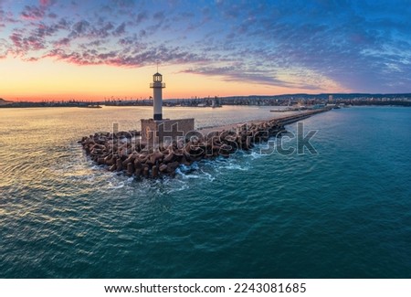 Aerial view of lighthouse at sunset in Varna sea port, Bulgaria.