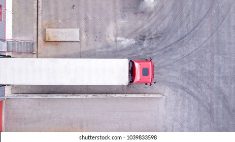 Aerial View of Loading Warehouse with Semi Truck. Aerial