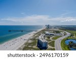 Aerial view of The Lodge at Gulf State Park and the beach at Gulf Shores, Alabama in July