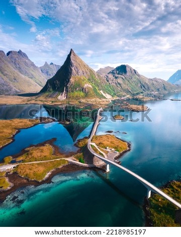 Aerial view in Lofoten Islands, Norway. Curvy archipelago road with mountains in background. Stock photo © 
