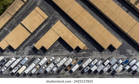 Aerial view of a long term self storage facility buildings and outdoor RV, campers and trailers storage.