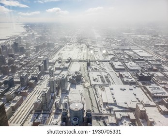 Aerial View Looking Down On The South Branch Of The Chicago River Filled With Ice After A Winter Snowstorm