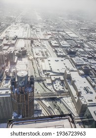 Aerial View Looking Down On The South Branch Of The Chicago River Filled With Ice After A Winter Snowstorm