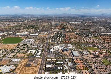 Aerial view looking north up Dobson Road at hospital and surrounding points of interest over Chandler, Arizona