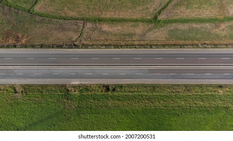Aerial view looking straight down of an empty road