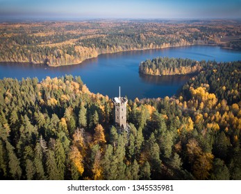 Aerial view of the lookout tower in autumn landscape at Aulanko nature reserve park in Hameenlinna, Finland. Fall colors make trees look beautiful colorful