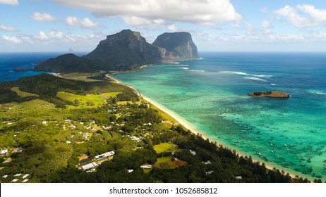 Aerial view of Lord Howe Island (World Heritage-listed paradise), turquoise blue lagoon and Mount Gower on background - New South Wales - Tasman Sea - Australia from above - Shutterstock ID 1052685812