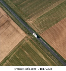 Aerial View Of A Lorry On A Road In The Fields In The Department Of Loir-et-Cher In France