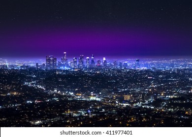 Aerial View Of Los Angeles Downtown City Night Skyline Over The Hollywood At Night. LA Valley California Cityscape Night Lights