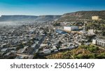 Aerial view of Lubango City showcasing urban development and mountainous landscape in Angola