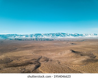 Aerial View In Lucerne Valley California.  Winter. Snow Mountains