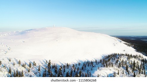 Aerial view of Luostotunturi fjeld, on a sunny winter morning dusk, in pyha-luosto national park, in Lapland, in north Finland