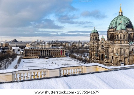 Aerial view of Lustgarten with the Berlin Cathedral and the Neues Museum with snow on a nice winter day, Berlin, Germany