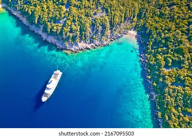 Aerial view of luxury large yacht anchored in turquoise bay of Mali Losinj island, Adriatic archipelago of Croatia