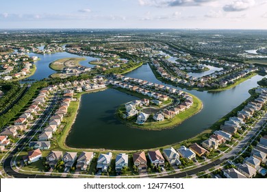 aerial view of luxury suburban home community in south florida
