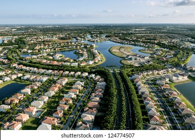 aerial view of luxury suburban home community in south florida