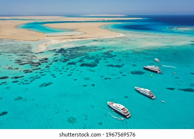Aerial view: Luxury Yachts in front of Tawila island in the Red Sea, Egypt