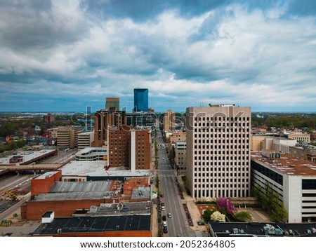 Aerial view of the main street in downtown Lexington, Kentucky with tall financial offices buildings situated on both sides