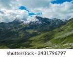 Aerial view of majestic mountain peak Vorder Geisslkopf in High Tauern National Park, Carinthia, Austria. Idyllic hiking trail Austrian Alps. Wanderlust paradise. Sense of exploration. Nature escape