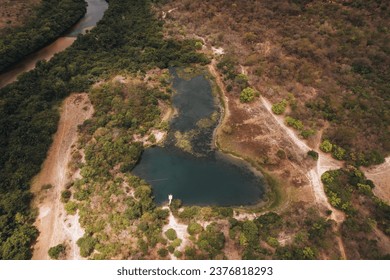 aerial view of man diving in Olhos d'água, Vale do Pati, Chapada Diamantina, Bahia, Brazil - Powered by Shutterstock