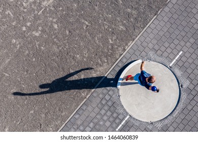 aerial view of a man in shot put in track and field - Powered by Shutterstock