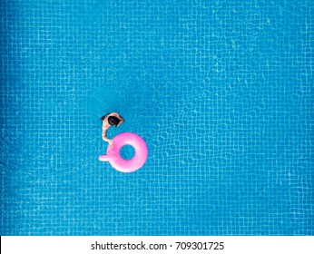 Aerial View, A Man In Swimming Pool In Summer