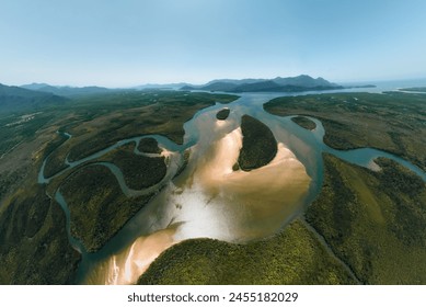 Aerial view of Mangroves in Hinchinbrook National Park. Mountains, rivers and Ramsay Bay Beach along the Thorsborne Trail on Hinchinbrook Island - Powered by Shutterstock