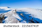 Aerial view of Maria Schnee mountain chapel in Austria on a beautiful winter day