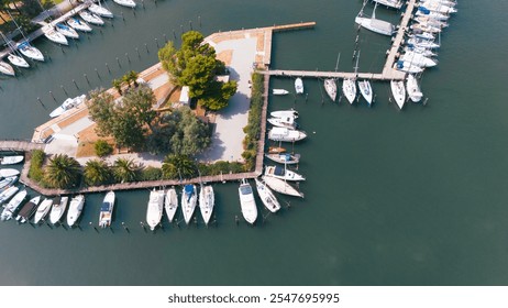 Aerial View of Marina with Docked Boats and Island Park - Powered by Shutterstock