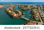 Aerial view of the marina of Policoro, in Basilicata, Italy. A small village with luxurious villas built between the canals.