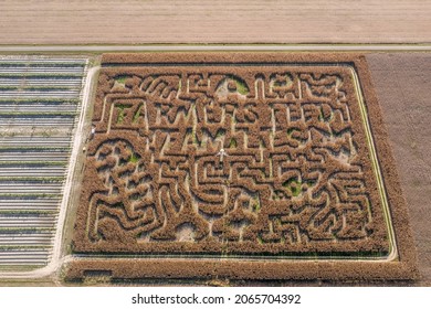 Aerial view of a Maryland corn maze labyrinth an American fall tradition before Halloween with farmers feed script - Shutterstock ID 2065704392