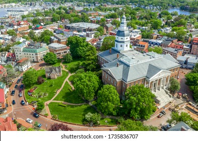 Aerial View Of Maryland State House Capitol Building White Dome And State Circle With Colonial Houses In  Annapolis On A Sunny Weekend Afternoon 