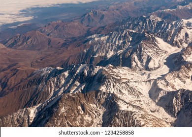 Aerial View Massive Snow Mountain Range In Georgia.