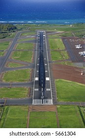 Aerial View Of Maui, Hawaii Airport With Pacific Ocean.