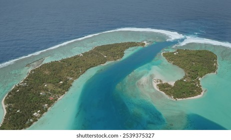 Aerial view of Maupiti island, coral reef motu entrance to lagoon bay, French Polynesia. Turquoise water, lush greenery, remote tropical beauty. Wild nature paradise. Exotic tourist travel destination - Powered by Shutterstock