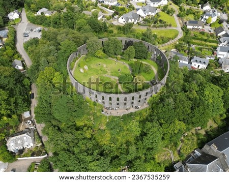 An aerial view of McCaig's Tower and Battery Hill, located in Oban, Scotland