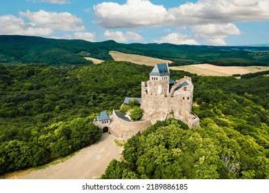 Aerial view of medieval ruined Holloko castle, UNESCO world heritage site in Hungary. Historical castle in Hungary Mountains