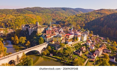 Aerial view of medieval town Loket nad Ohri near Karlovy Vary spa in Czech Republic. Historical city with castle from 12th century. Stunning scenic view of beautiful cityscape with nature.