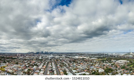 Aerial View Of Melbourne Cityscape With West Gate Bridge