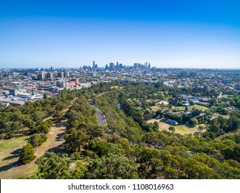 Aerial View Of Melbourne's Skyline Overlooking Yarra Bend Park