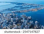 Aerial view of Miami skyline with skyscrapers at Downtown Brickell and Miami Beach at night blue hour in Miami, United States