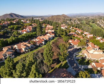 Aerial view of middle class neighborhood with residential house community in Rancho Bernardo during autumn season, South California, USA. - Powered by Shutterstock