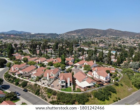Aerial view of middle class neighborhood with residential house community and mountain on the background in Rancho Bernardo, South California, USA. Foto d'archivio © 
