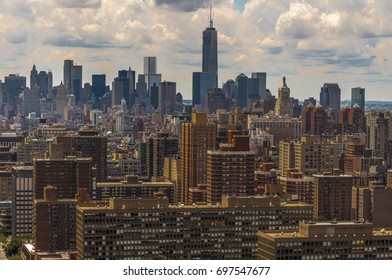 A aerial view of midtown Manhattan under a sky of thick clouds