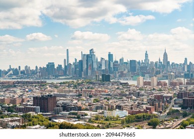 Aerial View Of Midtown New York City Form Jersey City. Bird's Eye View From Helicopter Of Cityscape Metropolis, Financial District And Residential Neighborhood.