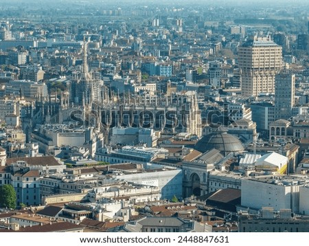 Aerial view of the Milan Cathedral. Duomo di Milano. Cathedral in white marble. Buttresses, pinnacles and spiers. Statue of the Madonnina. Lombardia. 04-12-2024. Italy
