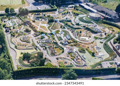 Aerial view of Mini Europe, a miniature park located in the Bruparck entertainment park, at the foot of the Atomium, in Brussels, Belgium, with reproductions of monuments in the European Union - Powered by Shutterstock