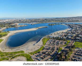 Aerial view of Mission Bay & Beaches in San Diego, California. USA. Community built on a sandbar with villas, sea port.  & recreational Mission Bay Park. Californian beach-lifestyle.
